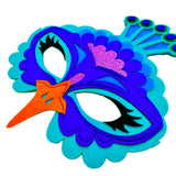 Close-up of peacock mask showing off details of felt materials, glitter accents, and stitching