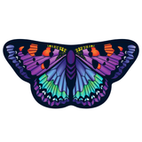 Colorful butterfly cape spread out on white background