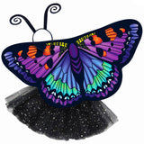 Exquisite butterfly cape costume set spread out against a clean white background with purple artemis-inspired patterned cape, yellow sparkle tutu, and black antennae headband. A wearable work of art!