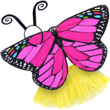 Exquisite butterfly cape costume set spread out against a clean white background with pink monarch-inspired patterned cape, yellow sparkle tutu, and black antennae headband. A wearable work of art!
