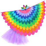 Bright rainbow bird costume with a fabric cape made with layers of pink, blue, orange, yellow, green, and purple fabric, felt bird headdress, and glittery purple tutu, set on a white background, perfect for a whimsical costume