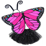 Exquisite butterfly cape costume set spread out against a clean white background with pink monarch-inspired patterned cape, black sparkle tutu, and black antennae headband. A wearable work of art!