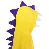 Side view of Children's Hooded Towel - Yellow Dinosaur design, revealing playful white felt teeth and a row of vibrant purple felt spikes running down the back. A whimsical bath time accessory for kids, bringing dinosaur adventures to life.